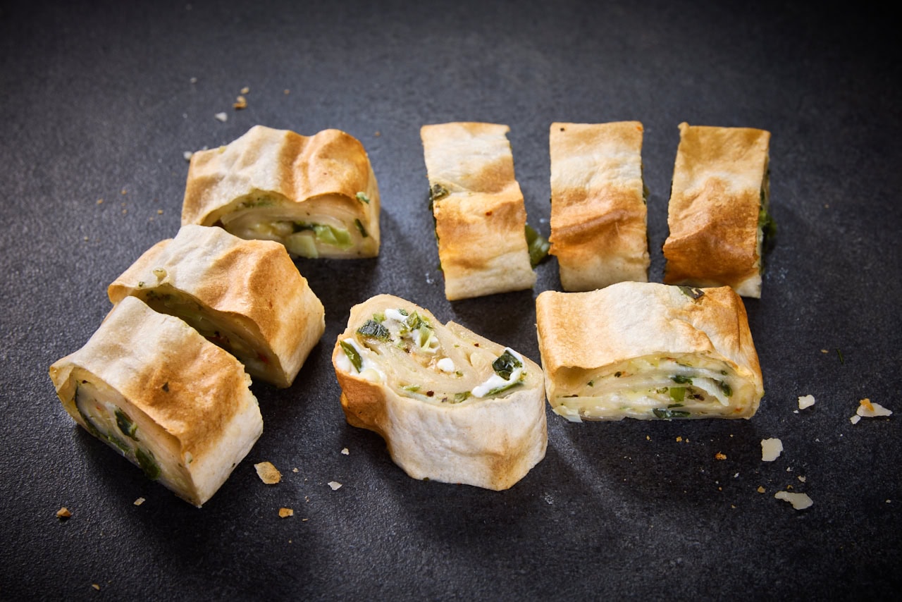 Flammkuchenröllchen mit Käse und Lauch - 8er